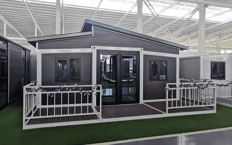 Sleek and modern portable classroom with a decorative front porch, demonstrating durability and practicality in its construction.