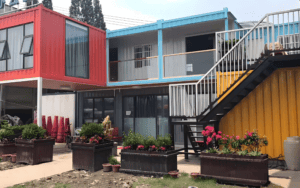 There is a colorful container house.