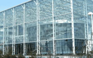 a steel frame structure with a glass facade