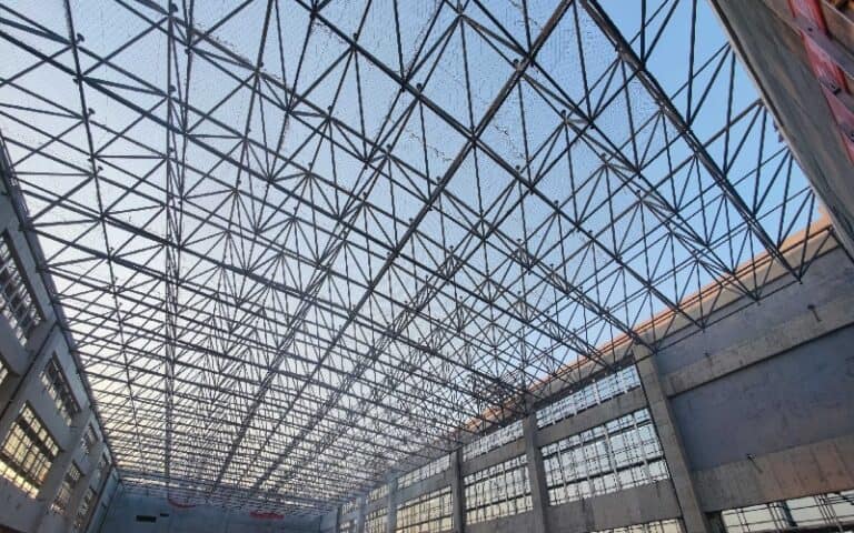 Steel roof truss structure, showcasing a type of steel structural component relevant to overall structural resistances.